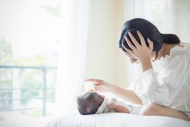 asian-mother-nursery-feeding-bottle-260nw-1075556396.jpg