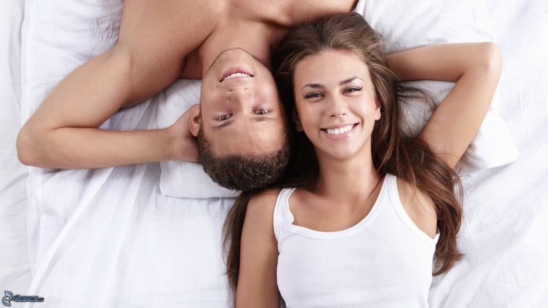 couple-on-bed-159679.jpg