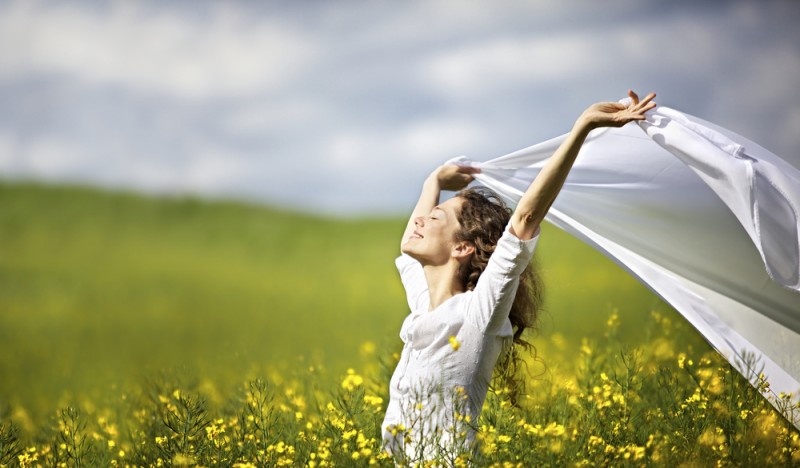 woman-yello-grass-happy.jpg