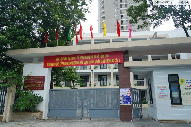 Phố phường Hà Nội nhộn nhịp cờ hoa chào mừng ngày chính thức vận hành chính quyền địa phương 2 cấp- Ảnh 11.