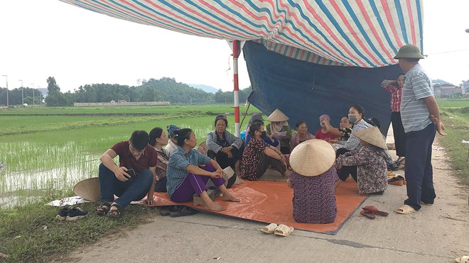 Hà Nội: Giải quyết triệt để vụ bãi rác Nam Sơn, hỗ trợ tạm cư cho dân 6 tháng - Ảnh 1.