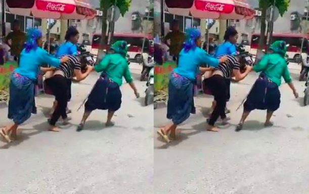 Cô gái bị nhóm phụ nữ đánh ghen, cắt quần áo kéo lê giữa phố ở Hà Giang gây xôn xao mạng xã hội - Ảnh 2.