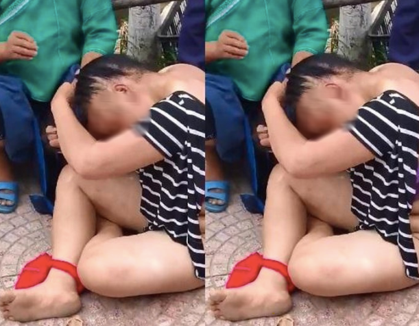 Cô gái bị nhóm phụ nữ đánh ghen, cắt quần áo kéo lê giữa phố ở Hà Giang gây xôn xao mạng xã hội - Ảnh 1.