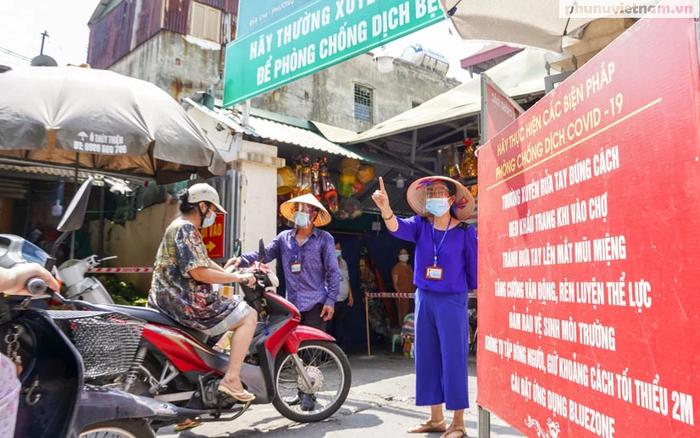 Người dân Hà Nội mong tiếp tục duy trì phiếu đi chợ - Ảnh 1.
