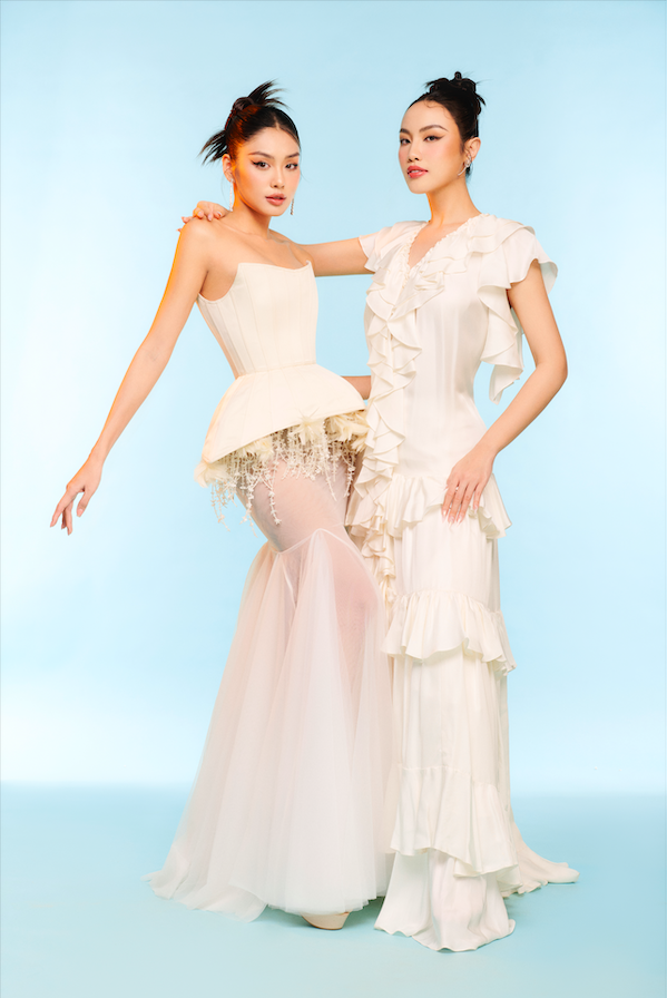 Bộ 3 Hoa hậu Hoàn vũ cùng nhau khoe sắc ngày Tết với sắc trắng trang nhã  - Ảnh 1.