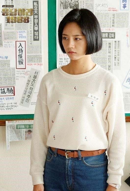 Danh tiếng mỹ nhân 29 tuổi lên như “diều gặp gió” khi đảm nhận vai nữ chính Sung Duk Sun trong Reply 1988 (2015)
