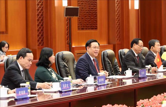 Hình ảnh về hoạt động của Chủ tịch Quốc hội Vương Đình Huệ trong chuyến thăm chính thức Trung Quốc- Ảnh 6.