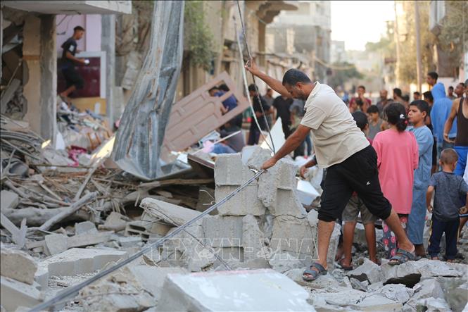 Nỗi đau sâu thẳm sau đống đổ nát ở Dải Gaza- Ảnh 6. Nỗi đau sâu thẳm sau đống đổ nát ở Dải Gaza- Ảnh 6.