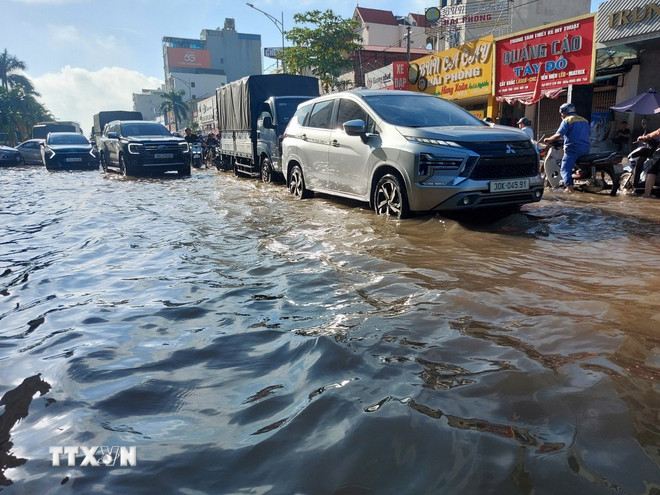 Bão Matmo có khả năng mạnh thêm, cảnh báo mưa lớn diện rộng ở Bắc Bộ, Thanh Hóa- Ảnh 1. Bão Matmo có khả năng mạnh thêm, cảnh báo mưa lớn diện rộng ở Bắc Bộ, Thanh Hóa- Ảnh 1.