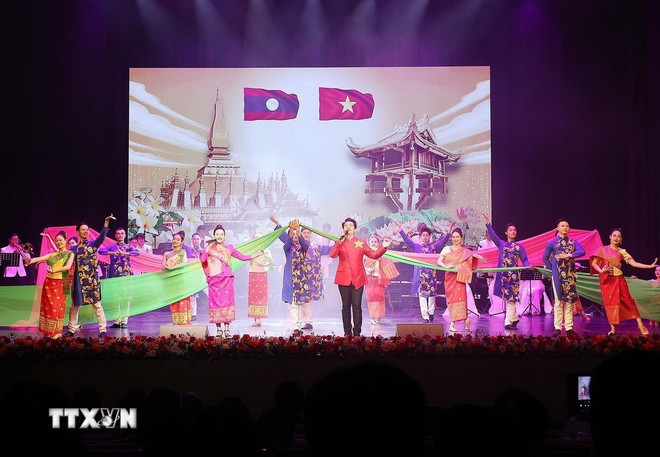 "50 năm qua là chặng đường lịch sử rực rỡ của nhân dân các dân tộc Lào"- Ảnh 2.