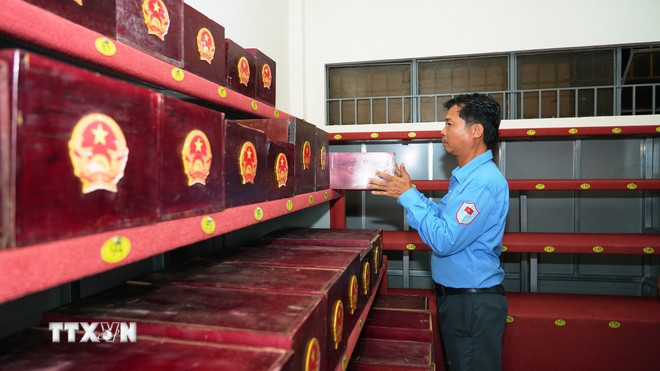 Đón hài cốt liệt sỹ quân tình nguyện Việt Nam hy sinh tại Campuchia về nước- Ảnh 3.