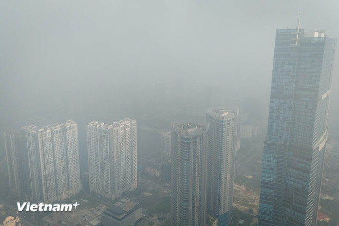 Hà Nội kích hoạt các biện pháp khẩn cấp giảm bụi, bảo vệ sức khỏe- Ảnh 1.