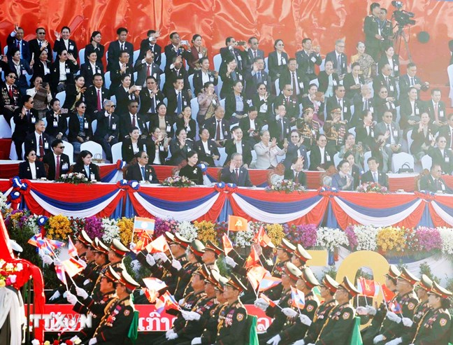 Kỷ niệm trọng thể 50 năm Quốc khánh nước Cộng hòa Dân chủ Nhân dân Lào- Ảnh 2.