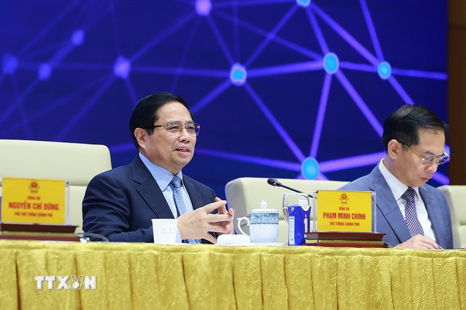 Thủ tướng: Kinh tế số là động lực, xã hội số là nền tảng, con người là trung tâm- Ảnh 1.