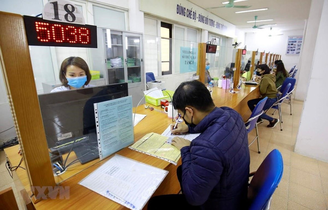 Trình Chính phủ chính sách hỗ trợ cán bộ không chuyên trách cấp xã trước 30/5- Ảnh 1.