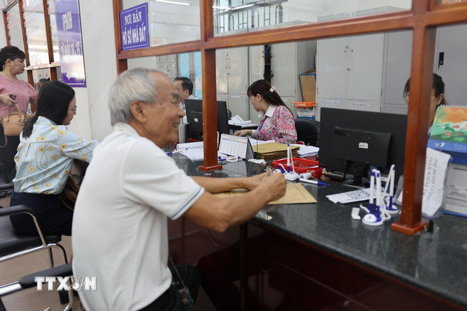 TPHCM: Kiện toàn và "nâng chất" để bộ máy hành chính thực sự hiệu quả- Ảnh 2.
