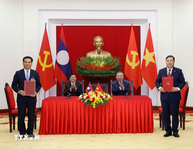 Tổng Bí thư Tô Lâm và Tổng Bí thư, Chủ tịch nước Lào chứng kiến lễ ký các văn kiện- Ảnh 4.