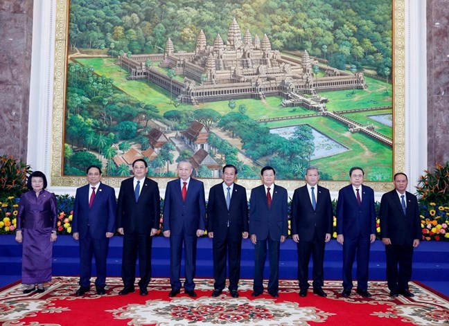Cuộc gặp giữa Người đứng đầu ba Đảng Việt Nam-Campuchia-Lào- Ảnh 3.