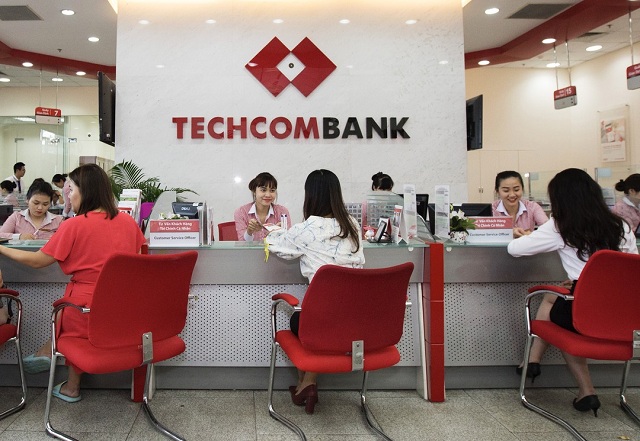 Tín dụng chạy nhanh hơn huy động, ngân hàng chịu sức ép kép - Ảnh 2.