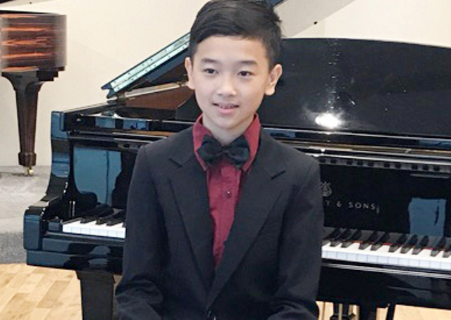 Cậu bé chuyên toán giành giải quốc tế piano - Ảnh 1.
