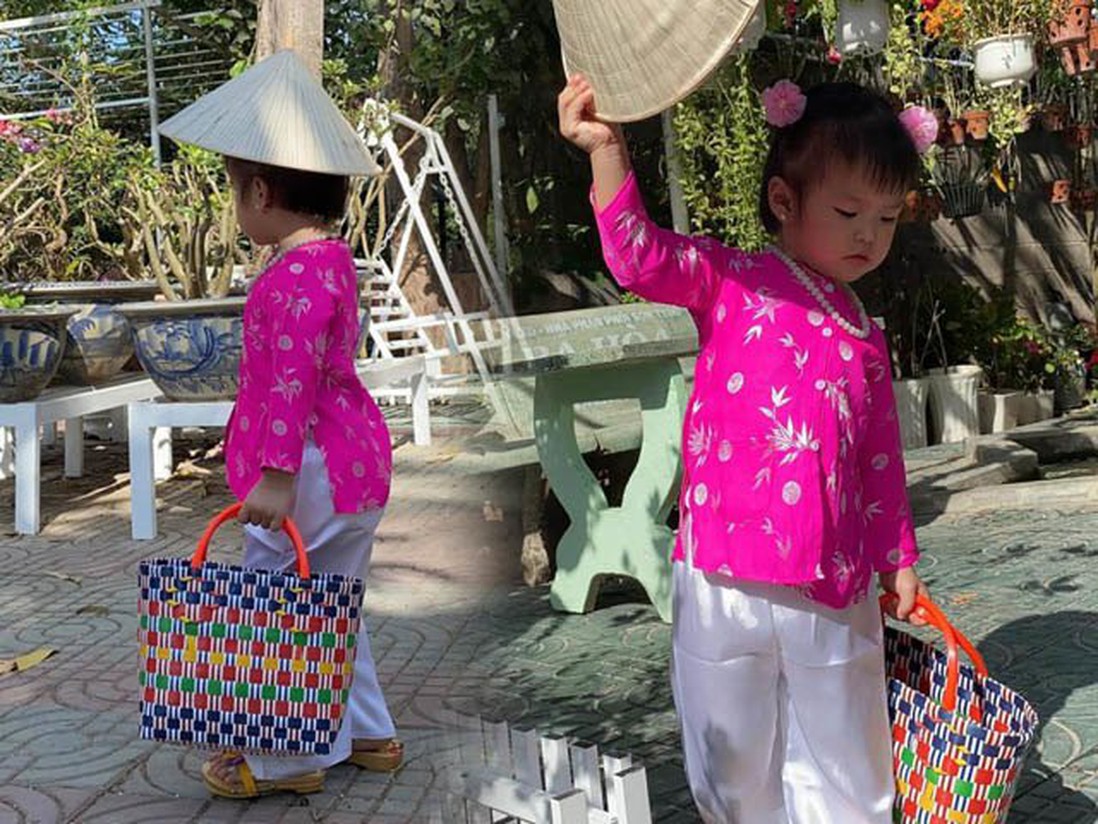 Con gái Lê Phương diện áo bà ba, xách làn đi chợ