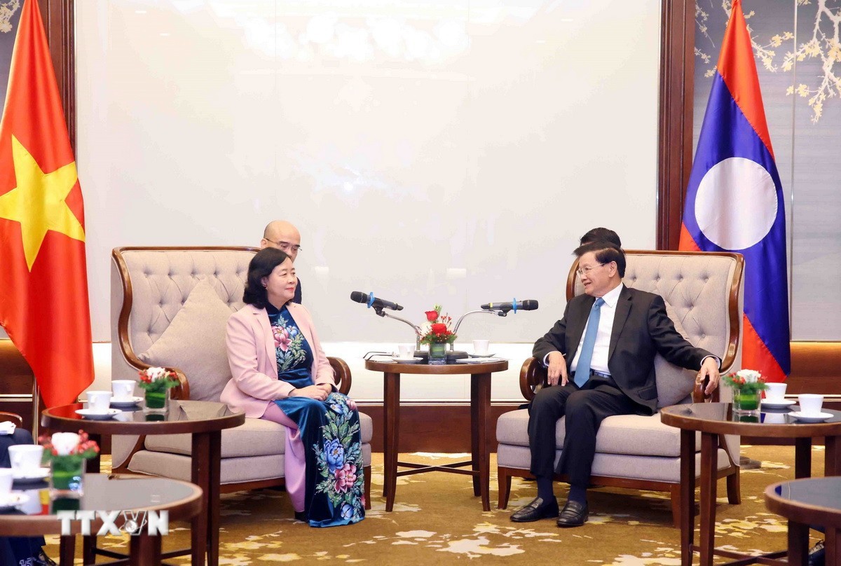 Tăng cường chia sẻ kinh nghiệm và giao lưu hữu nghị giữa Mặt trận hai nước Việt Nam - Lào- Ảnh 1.