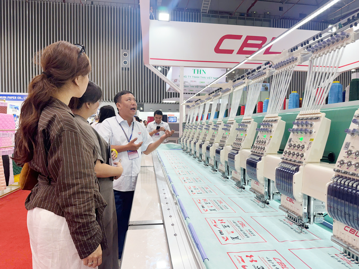 Ngành dệt may ưu tiên tìm đơn hàng, giữ chân lao động - Ảnh 1.