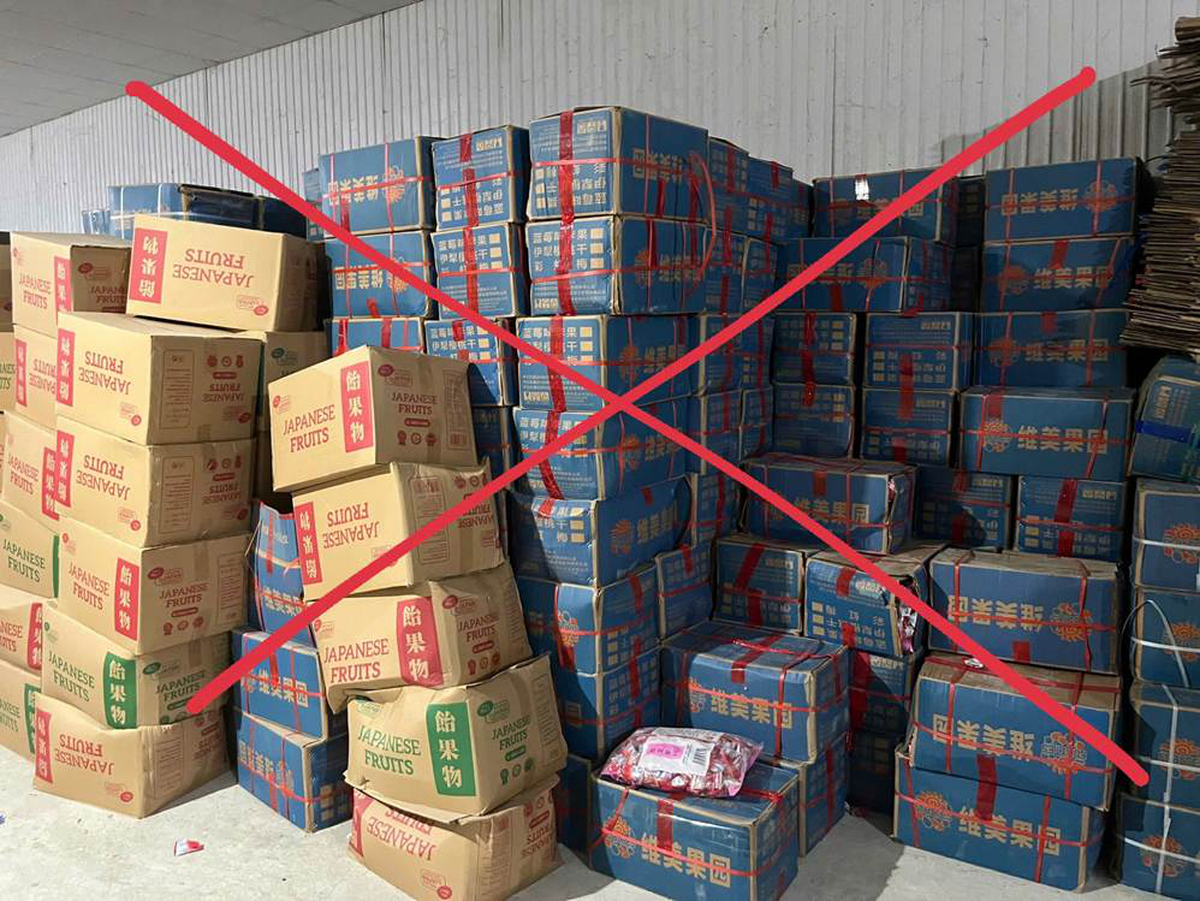 Khởi tố chủ cơ sở sản xuất 19,3 tấn bánh kẹo giả nhập ngoại - Ảnh 1.