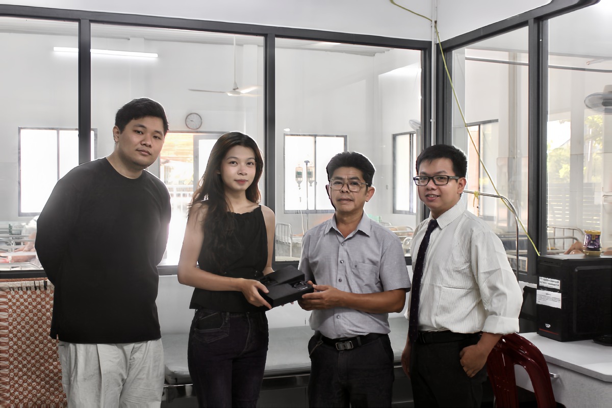 "Cánh tay nối dài" của người khuyết tật- Ảnh 1.