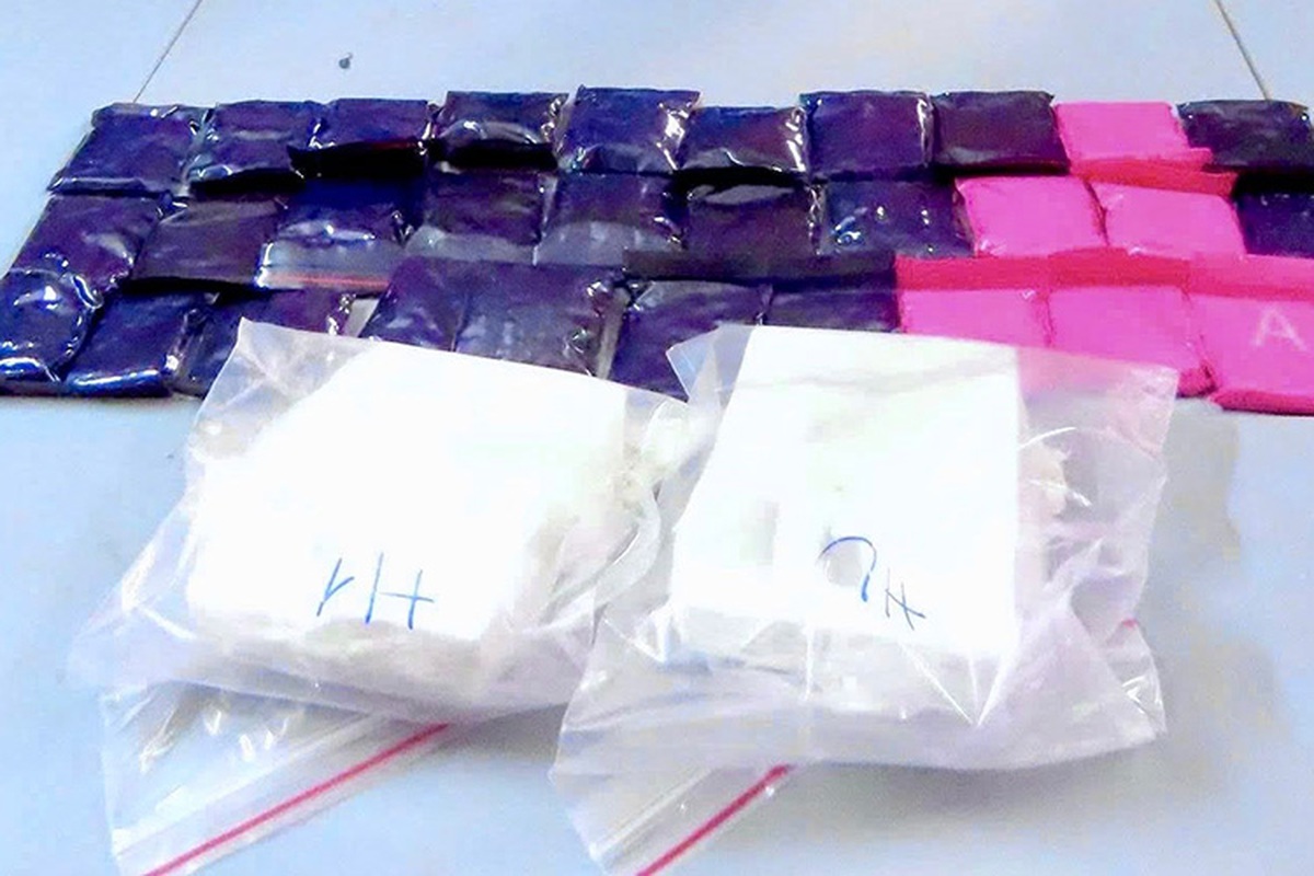 Bắt đối tượng vận chuyển 2 bánh heroin, 6.000 viên ma túy- Ảnh 1.