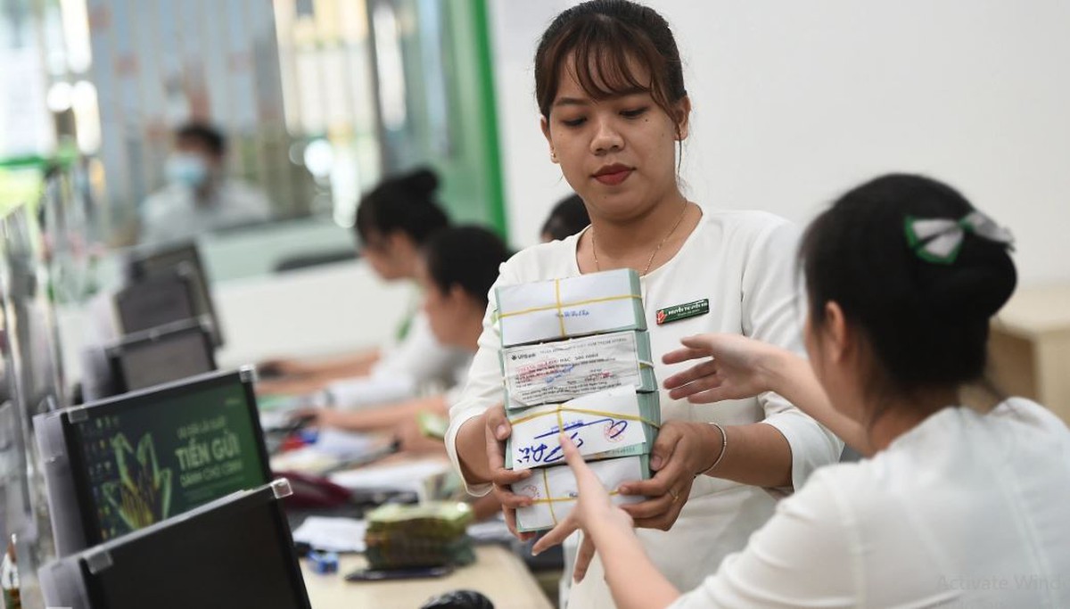 Lãi suất giảm - Trợ lực cho tăng trưởng kinh tế- Ảnh 1.