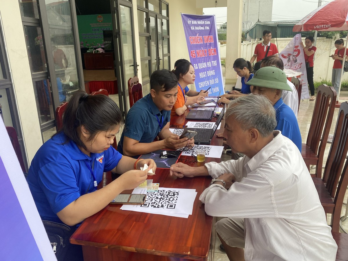 41 Tổ chuyển đổi số cộng đồng: "Cánh tay nối dài" đưa công nghệ đến từng người dân- Ảnh 1.