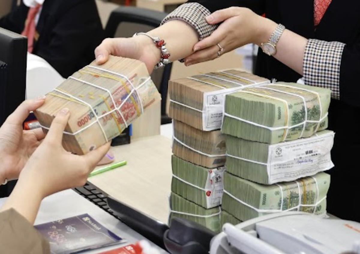 Lãi suất qua đêm về 0,7%/năm: Thanh khoản ngân hàng đang “dễ thở” hơn?- Ảnh 1.