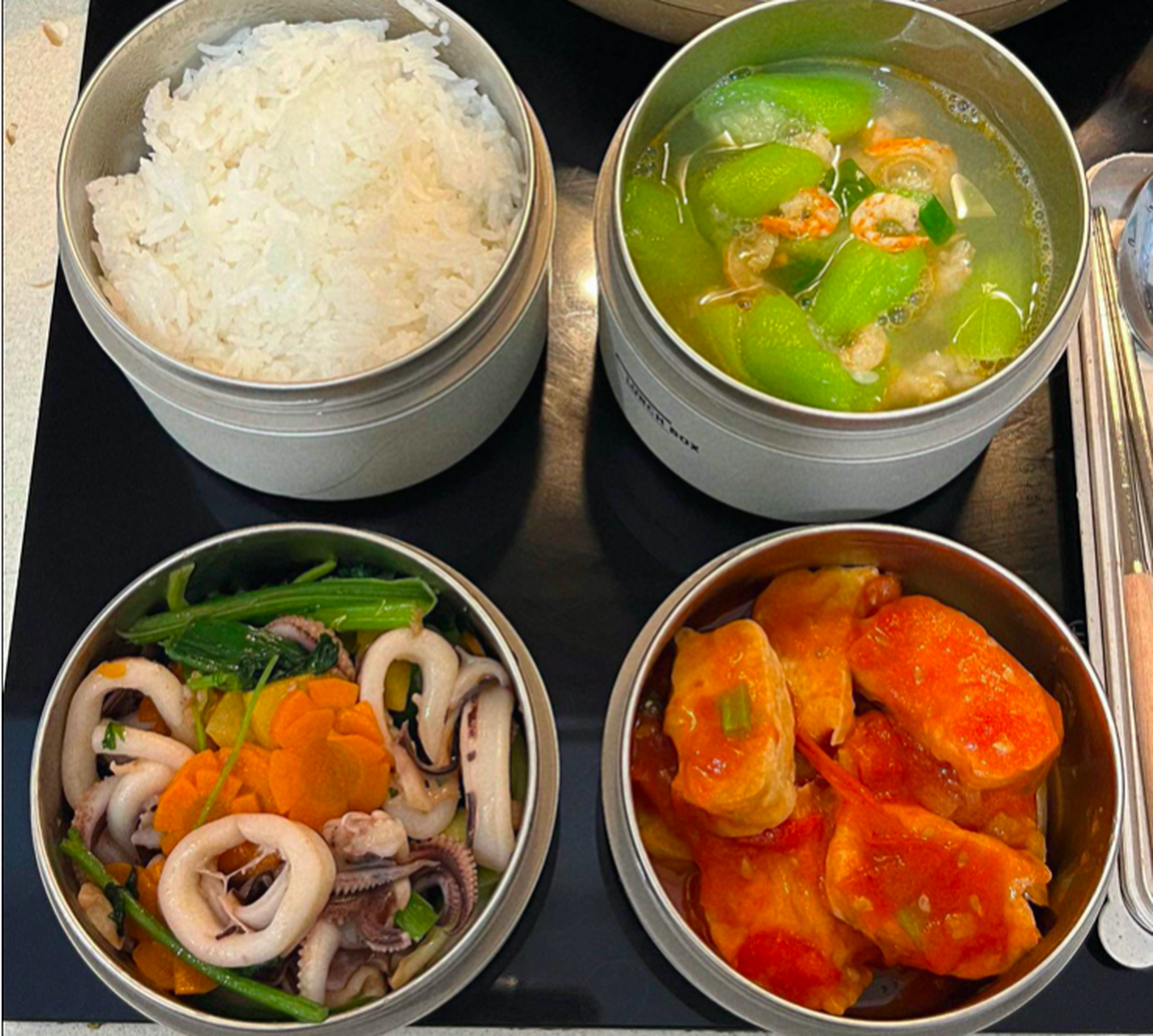 Chồng mang cơm trưa cho đồng nghiệp nữ - Ảnh 1.