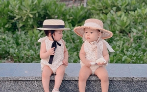 2 bé gái diện đầm đôi dễ thương trong chuyến du lịch biển