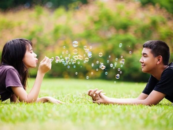 Watching outdoor couple asian