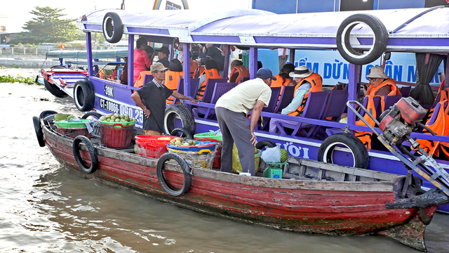 Chợ nổi Cái Răng: Một thoáng bình yên giữa dòng sông Hậu- Ảnh 4. Chợ nổi Cái Răng: Một thoáng bình yên giữa dòng sông Hậu- Ảnh 4.