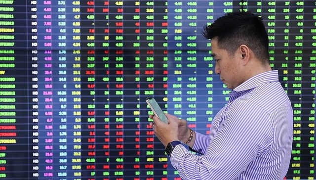 VN-Index vượt mốc 1.730 điểm nhờ dòng tiền ngoại đổ mạnh vào ngân hàng- Ảnh 2.