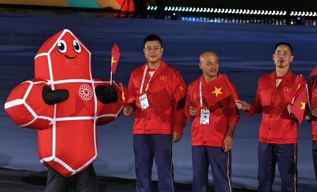 Đoàn thể thao Việt Nam rạng rỡ diễu hành khai mạc SEA Games 33- Ảnh 6. Đoàn thể thao Việt Nam rạng rỡ diễu hành khai mạc SEA Games 33- Ảnh 6.