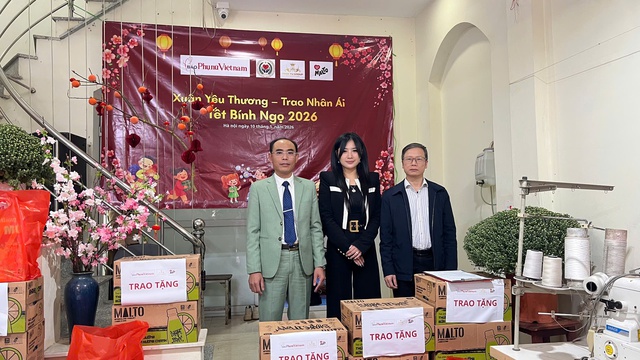 Báo Phụ nữ Việt Nam thăm, tặng quà trẻ em khuyết tật nhân dịp năm mới- Ảnh 4.