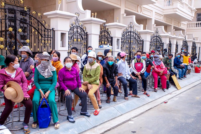 7 chuyến xe nghĩa tình đưa hơn 300 người nghèo ở thành phố Hồ Chí Minh về quê ăn Tết - Ảnh 1.