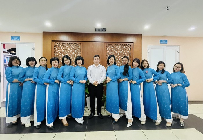 Khoảnh khắc duyên dáng, năng động trong tà áo dài xanh của Hội LHPN Việt Nam  - Ảnh 4.