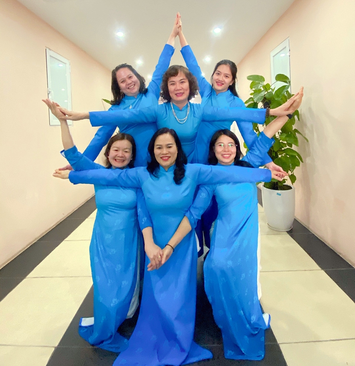 Khoảnh khắc duyên dáng, năng động trong tà áo dài xanh của Hội LHPN Việt Nam  - Ảnh 3.