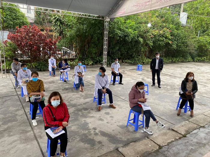 Những hình ảnh về đợt tiêm chủng vaccine ngừa Covid-19 tại Việt Nam - Ảnh 1.