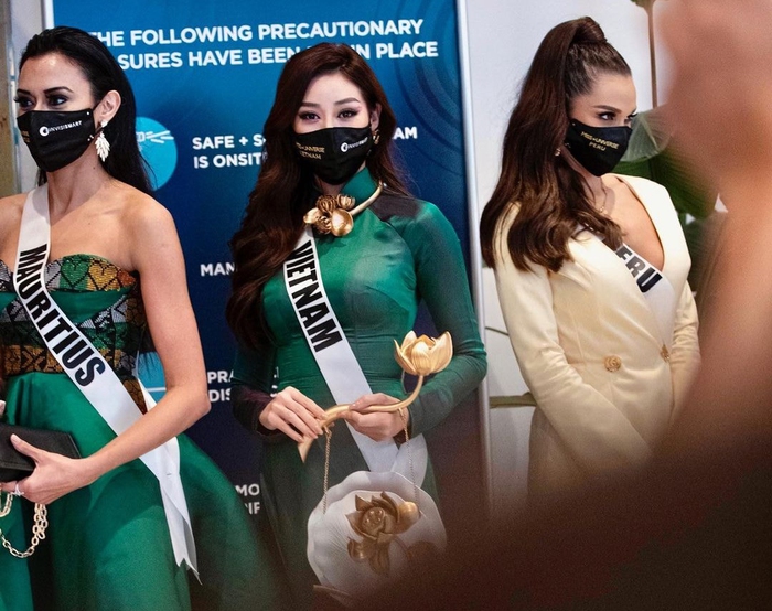 Khánh Vân duyên dáng với áo dài, vẫy cờ Tổ quốc tại Miss Universe - Ảnh 4.