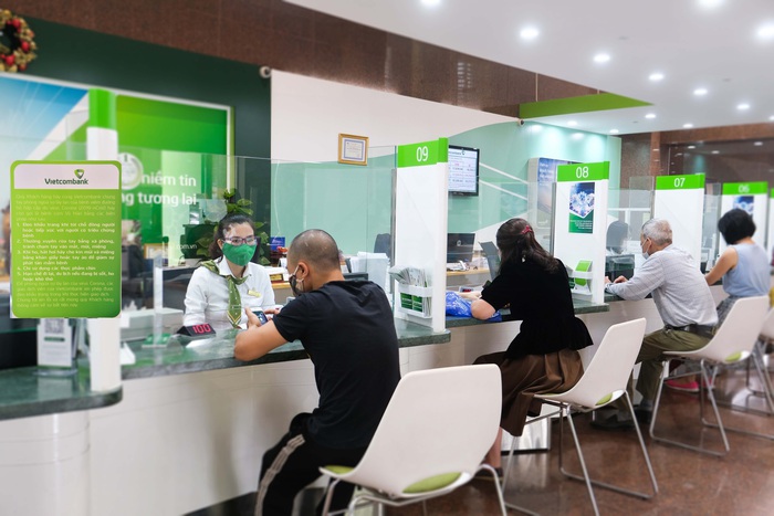 Vietcombank giảm lãi suất tiền vay hỗ trợ khách hàng bị ảnh hưởng bởi Covid-19 - Ảnh 1.