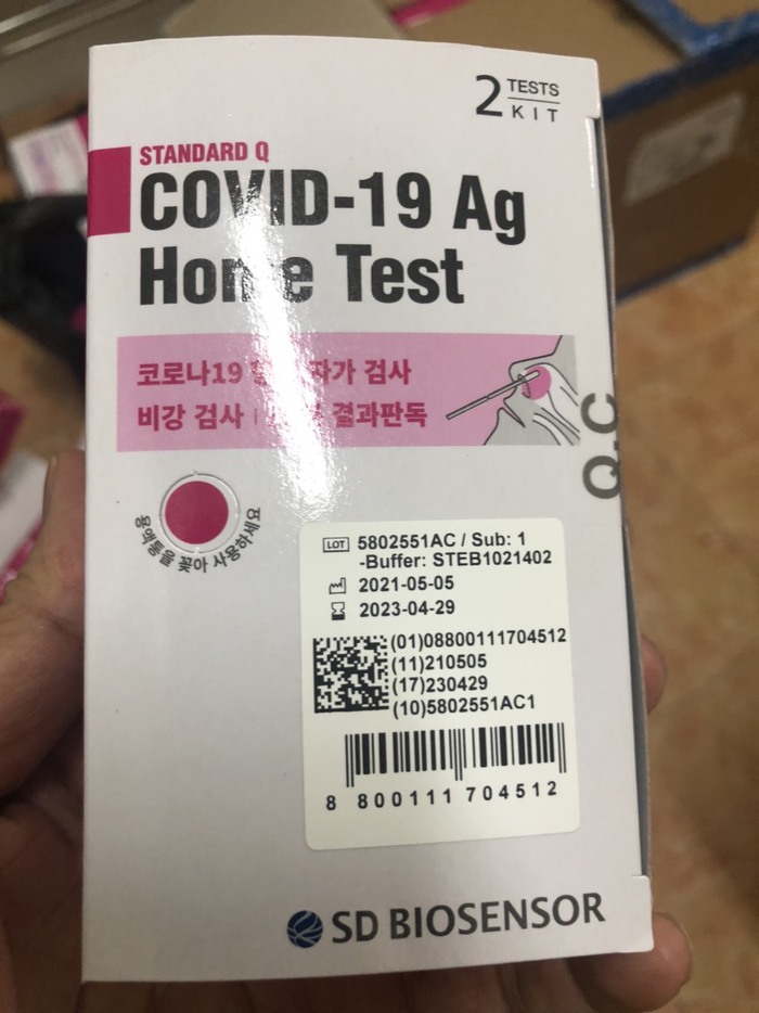 Một phụ nữ bị phạt 60 triệu đồng vì tàng trữ, vận chuyển 400 hộp test Covid-19 nhập lậu - Ảnh 1.