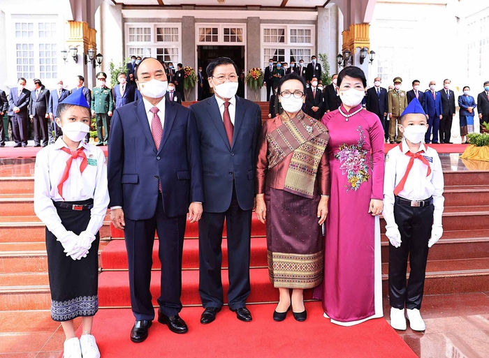 Chủ tịch nước Nguyễn Xuân Phúc và Phu nhân thăm hữu nghị chính thức CHDCND Lào - Ảnh 2.