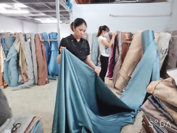 Cô gái khuyết tật tạo việc làm cho nhiều lao động đồng cảnh - Ảnh 1. Cô gái khuyết tật tạo việc làm cho nhiều lao động đồng cảnh - Ảnh 1.
