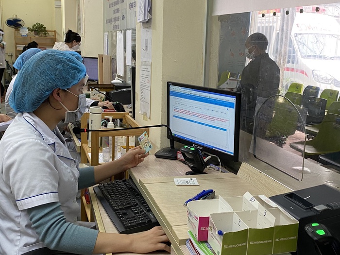 BHXH Việt Nam thí điểm sử dụng căn cước công dân gắn chip trong khám chữa bệnh BHYT - Ảnh 2.